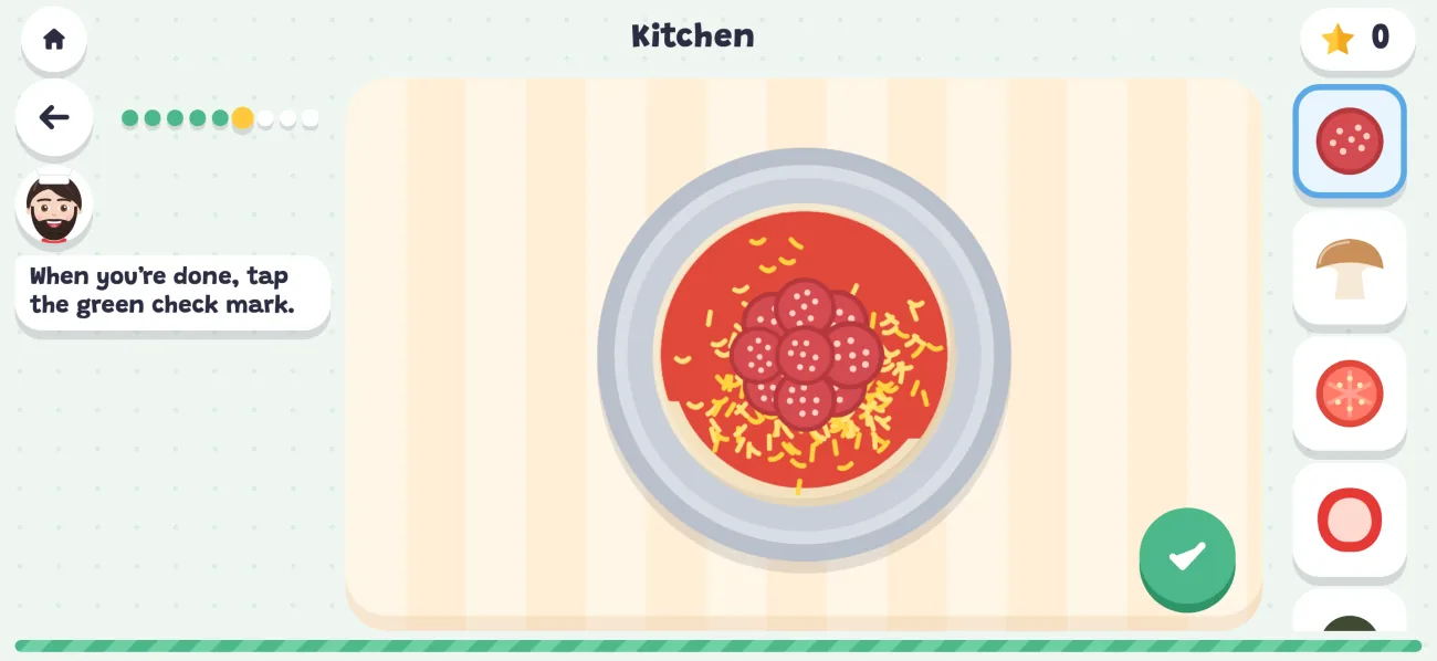 A pizza in the kitchen with Daddy as the chef